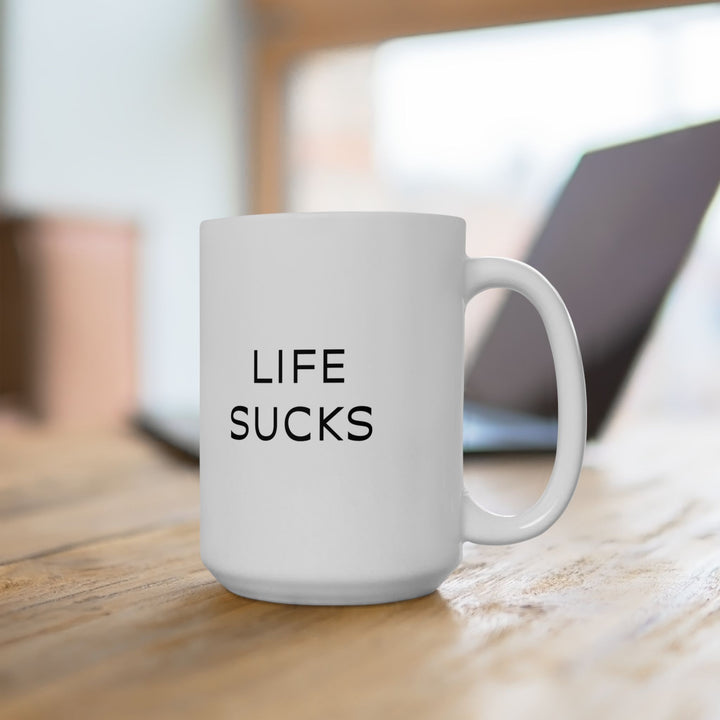 At Least I'm Getting Paid – Life Sucks – White Mug